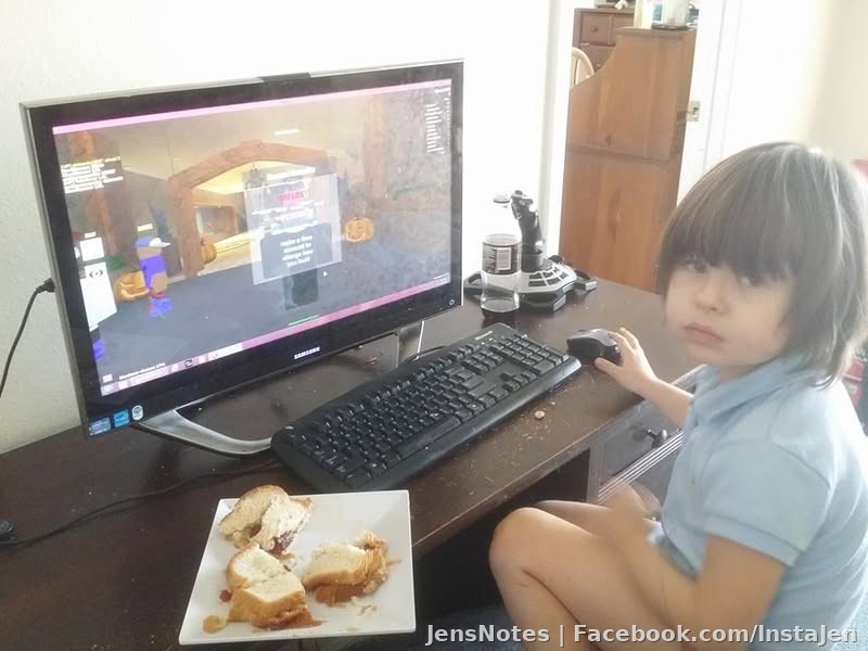 Ms. Snooty computing....which she learned to do well before making her first sandwich ever today...pictured. Lol. Its a touch screen so her snack isn't
