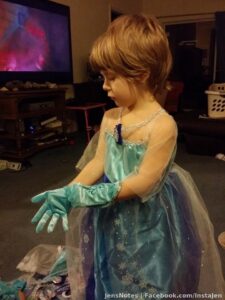 Miss Ava...aka...Miley....trying on her new queen Elsa attire. Complete with musical gloves! Frozen will never melt in this household!