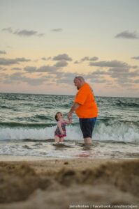 Meeting the Atlantic Ocean for the first time! Naturally neither of them know I'm taking the shot, I hide off in the sand :)