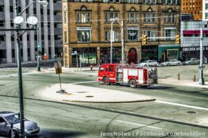 It looked like a toy down there from the steps of the Wayne County building... in such an empty city.