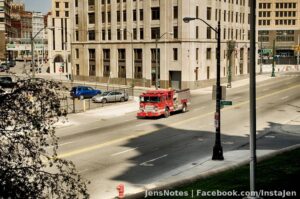 Little toy fire truck in a big empty town... from another angle.