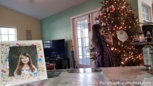 My Caitlyn adding her decorations to our tree!??