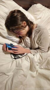 When your child spends so much time on their phone that this becomes their new sleep position. I feel like she should be holding