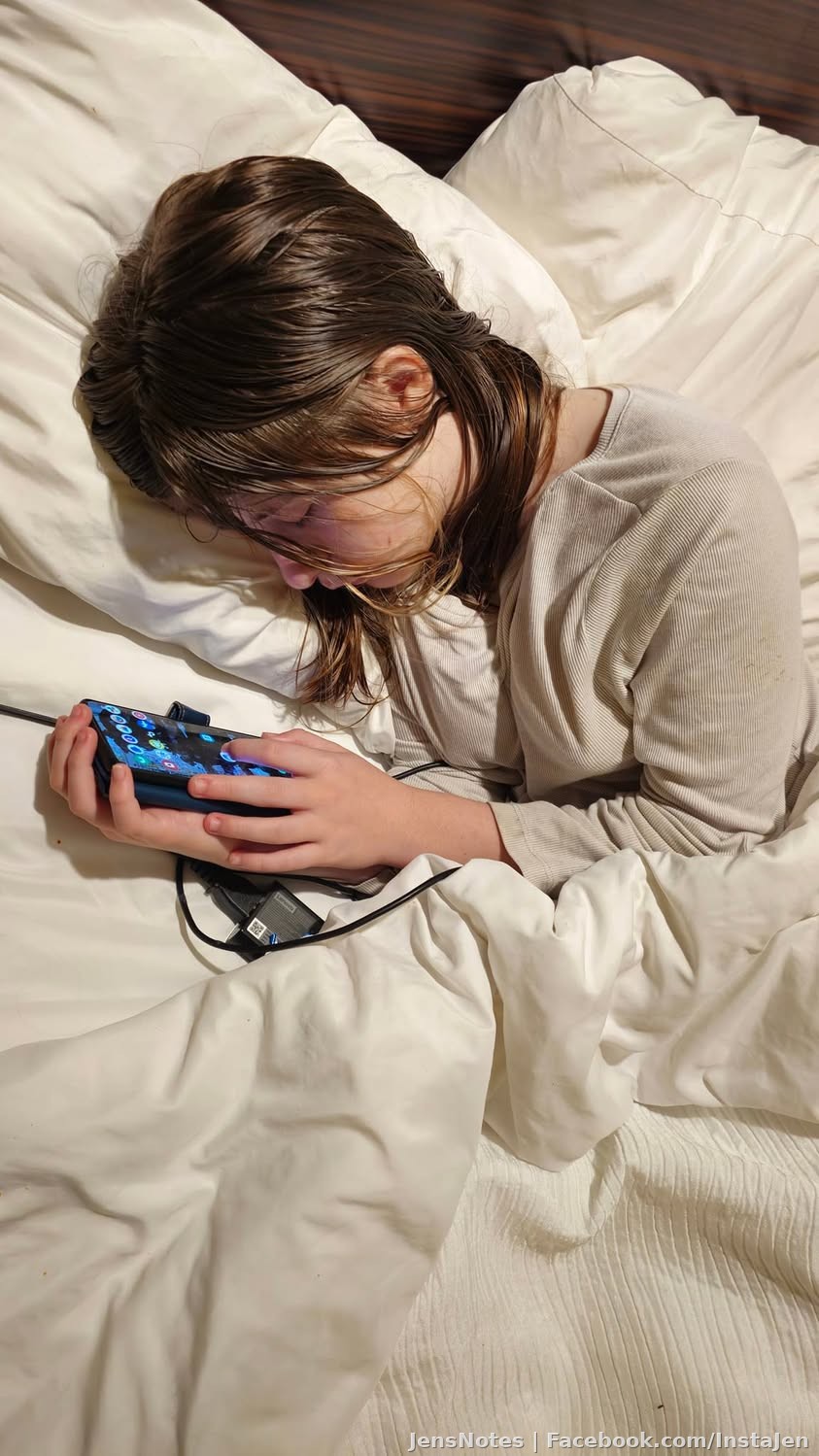 When your child spends so much time on their phone that this becomes their new sleep position. I feel like she should be holding