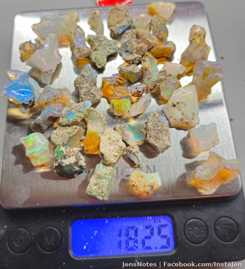 My 183ish carats of raw opals. Some have amazing colors. I've cleaned the rock off around some of them to expose more but I