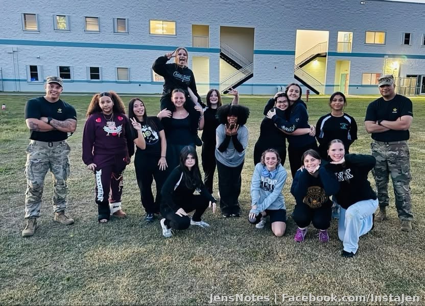 Caitlyn has joined the Bayside Lady Bears wrestling team (front row left in black) and she's currently going through hell week. Every day recruiters