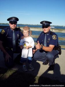 This photo was the best moment for Chris in his tiny life back then!! Does anyone know who these Michigan State Troopers are?